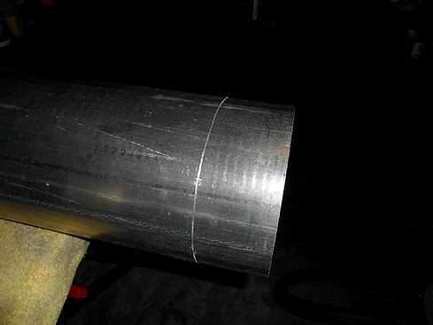 Main tube being cut to proper size - 5. (Click to go to page)