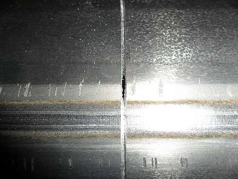 Main tube being cut to proper size - 6. (Click to go to page)