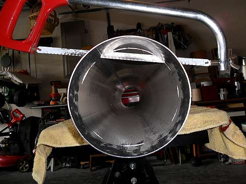 Main tube being cut to proper size - 8. (Click to go to page)