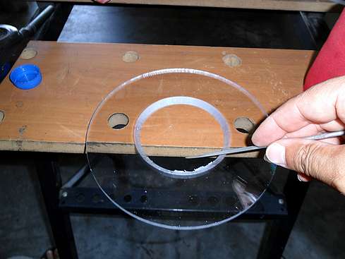 Small file being used to remove the burrs from the baffle's knife edge - 30 (Click to go to page)