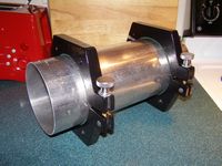 The completely assembled cradle rings test fitted on a scrap piece of 5" aluminum tubing - Knurled Knob Side.