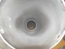 The rear inside portion of the first baffle in the main tube primed.